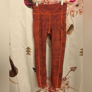 Size 4 lululemon Orange Patterned Women's leggings​